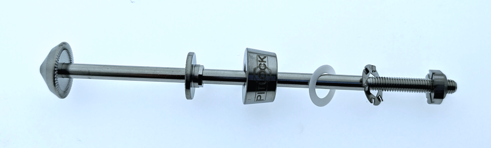 A Pitlock locking axle with coded nut, spring washer, PTFE washer, locking ring and pressure washer